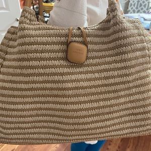 Beige straw like Anne Klein bag in great shape.  Like new.